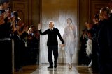 Armani's will instructs heirs to sell fashion brand or seek listing