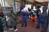 Government condemns blocking foreigners from accessing healthcare