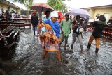 WATCH | Heavy rain triggers floods, landslides in DRC