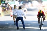 Pogacar crashes as anti-Israel protester disrupts Tour stage finale