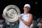 Swiatek thrashes Anisimova 6-0 6-0 to win Wimbledon title