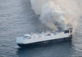 Burning cargo ship carrying 3,000 vehicles abandoned off Alaska