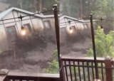 Shocking moment dangerous floods sweep away entire house [Watch]