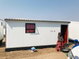 Relocated flood victims relieved to have a place to call home again