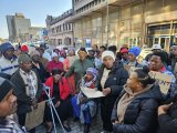 Elderly residents descend on metro offices demanding better housing