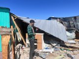 Police van crashes into shacks, injures two, and leaves families homeless