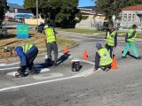 Newton Park business group gets stop signs repainted