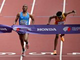 Simbu snatches marathon gold from Petros in historic photo finish