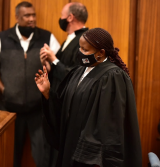 Fraud-accused advocate appears in court