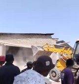 WATCH | Municipality demolishes over 65 houses illegally built on state land
