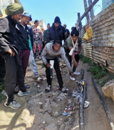 Residents, police clash in protest over power outages