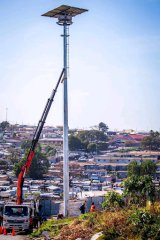 Duncan Village residents welcome BCM’s installation of solar-powered security lights