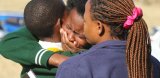 BEHIND THE NEWS: Nothing prepared me for heartbreaking memorial for young flood victims
