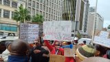 New Horizon residents rally for improved housing conditions amid ongoing struggles