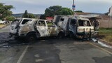 Armed gang rams cash-in-transit vehicle, steals money and sets vehicles alight in dramatic heist
