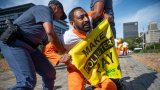 Activists rally against fossil fuels as African Energy Week unfolds