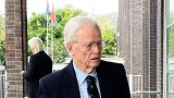 Iain Wares, former teacher, surrenders to authorities over international child abuse charges