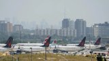 Air Canada flight attendants vow to defy back-to-work order as strike talks resume