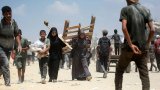Chaos, gangs, and gunfire: Woefully insufficient Gaza aid fails to reach the most needy
