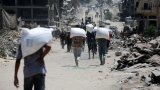 'Very insufficient' aid entering Gaza, Germany says, as two million face starvation
