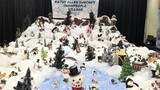 In tribute to late wife, husband rebuilds her snowman village