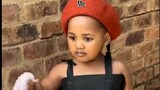 WATCH: Adorable little girl steals the show in viral TikTok video wearing Woolies bag 'catsuit'