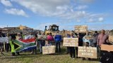 Senior citizens protest against new school construction in Coniston Park