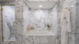 It's a whole lotta marble! - Designers on Trump’s Lincoln Bathroom
