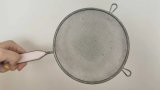 I Tried TikTok's Spoon Trick To Clean My Sieve, And I'm Never Going Back