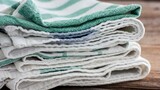 Why are new tea towels worse at drying dishes than older ones?