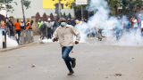 Kenyan police fire teargas at protesters after death of blogger in custody