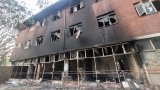Two found dead in burnt abandoned building