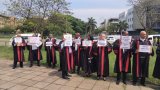 Magistrates protest outside court, demanding higher wages