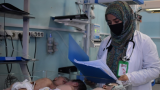 Afghanistan’s health crisis: children share beds as hospitals overflow
