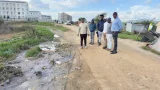 These families have no toilets, but sewage from other people’s toilets flows past their homes
