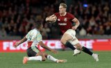 Lions survive ferocious battle